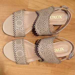 Sandals with a cut out feature